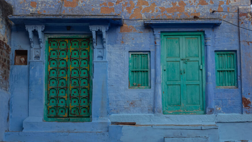 The blue washed walls and painted doors of Jodhpur's alleyways