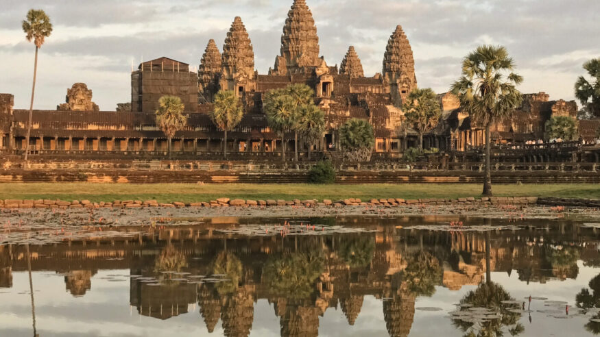 Beautiful view of Angkor Wat in the golden sunlight before sunset in Siem Reap, Cambodia.
