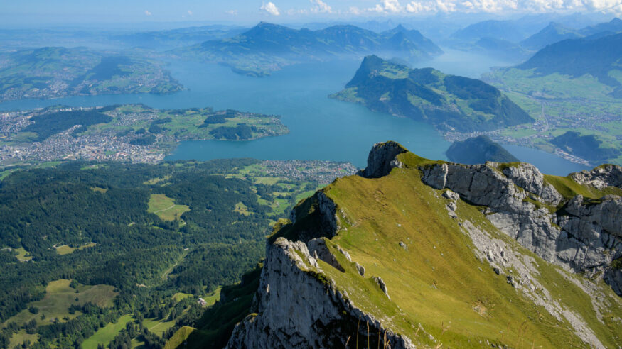 View of Lake Lucerne on a sunny day with clouds in the sky