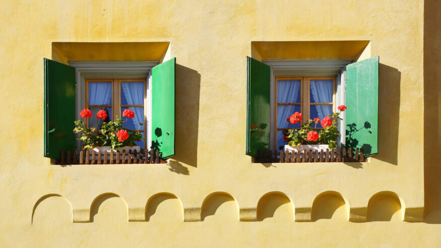 The ancient traditional window in historic medieval old town. The Zuoz today is one of the best preserved villages of the Upper Engadin.
